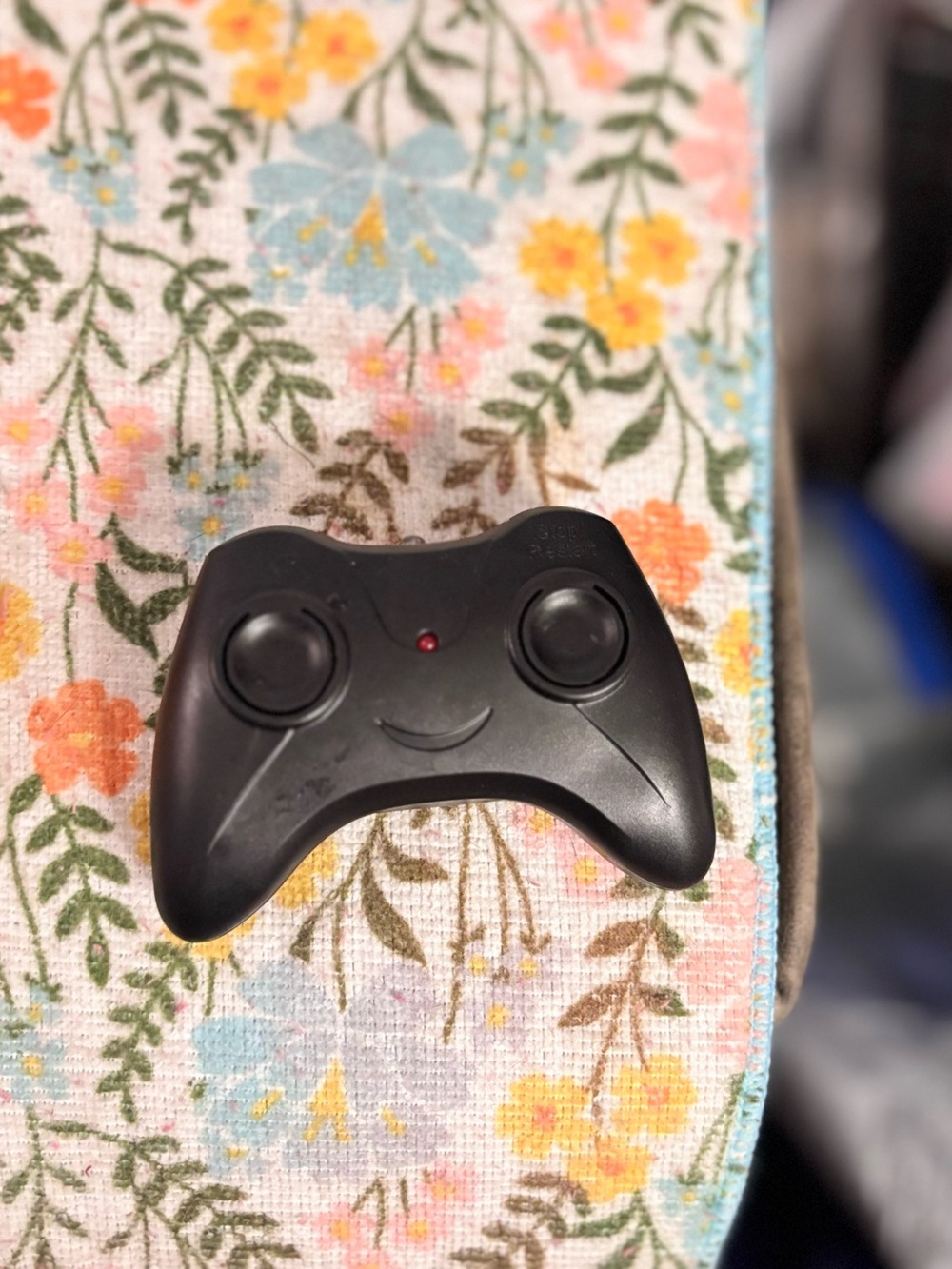 a 2.4GHz remote controller typically used for entry-level RC foam aircraft